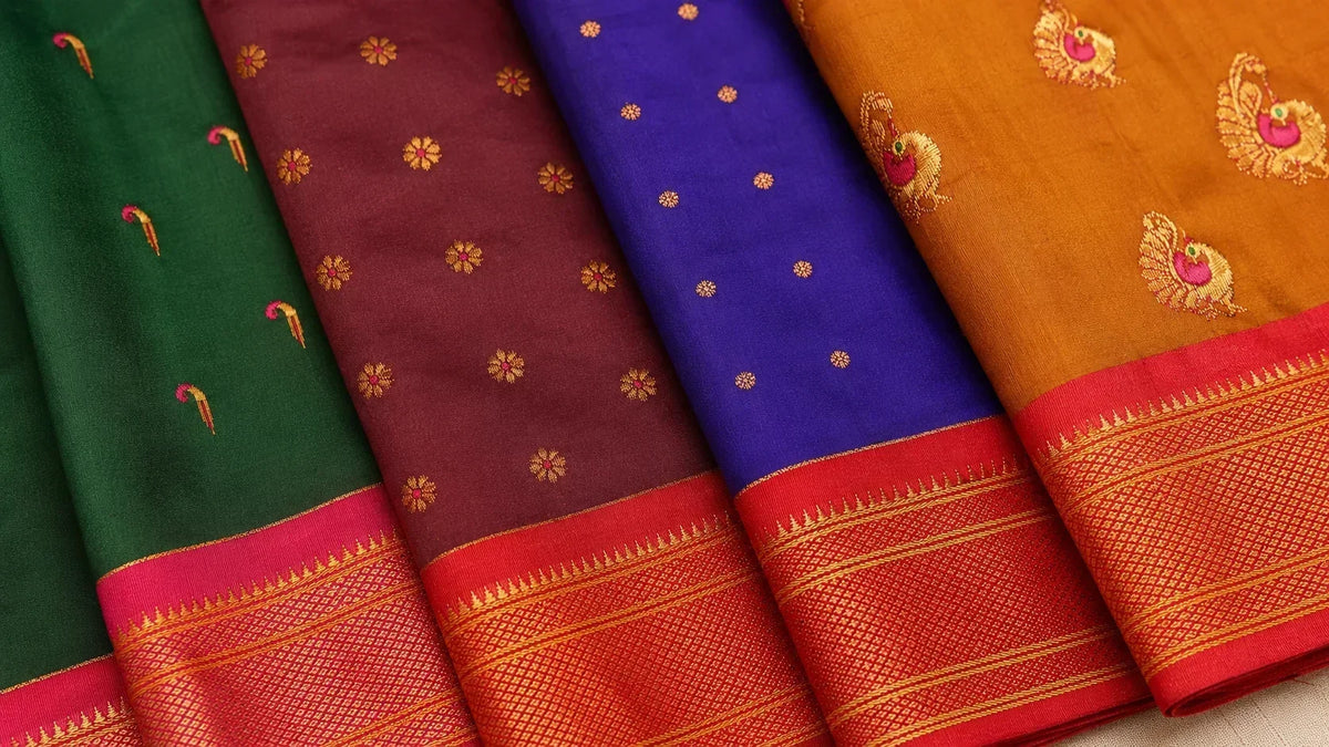 Paithani saree pallus showing peacock butta, muniya parrot butti, floral meena and zari star motifs woven in copper zari