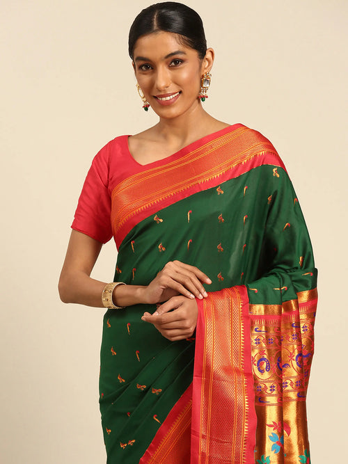 Muniya paithani saree soft silk in bottle green and red with muniya peacock meena butti - closeup view showing fabric and zari work for wedding wear