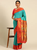 Muniya paithani saree silk blend in chintamani and red with muniya peacock meena butti - styled model view for wedding wear