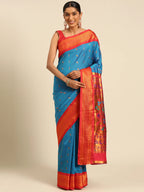 Muniya paithani saree silk blend in firozi and red with muniya peacock meena butti - front view for wedding wear