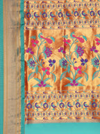 Muniya paithani saree silk blend in hot, pink and rama with muniya peacock meena butti - pallu detail showing woven motif design for wedding wear