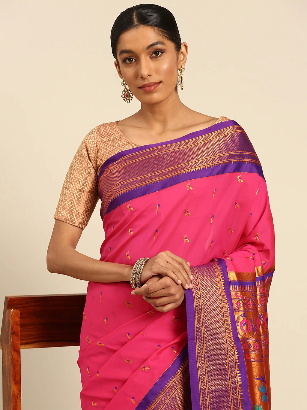 Muniya paithani saree silk blend in hot, pink and violet with muniya peacock meena butti - closeup view showing fabric and zari work for wedding wear