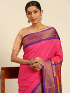 Muniya paithani saree silk blend in hot, pink and violet with muniya peacock meena butti - closeup view showing fabric and zari work for wedding wear