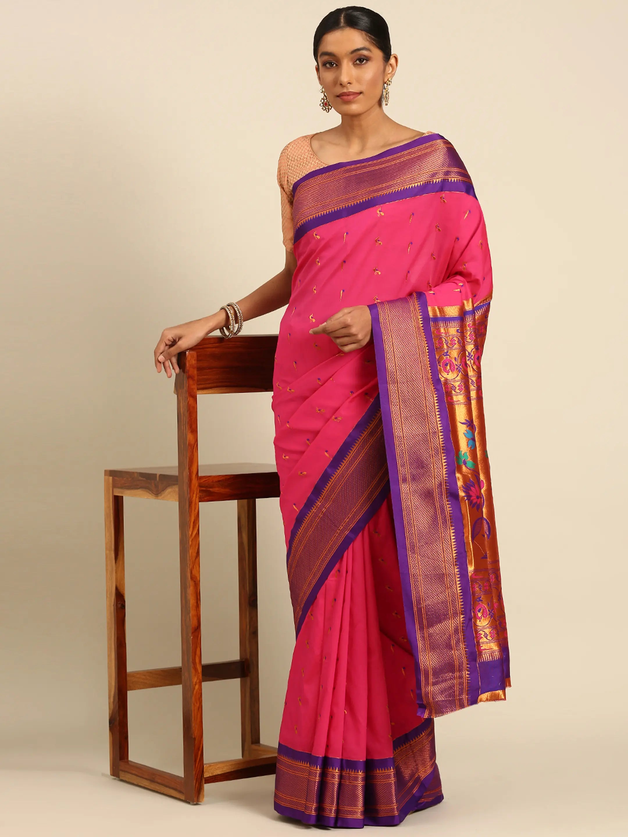 Muniya paithani saree silk blend in hot, pink and violet with muniya peacock meena butti - styled model view for wedding wear