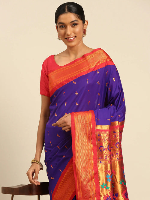 Muniya paithani saree soft silk in indigo blue and red with muniya peacock meena butti - closeup view showing fabric and zari work for wedding wear
