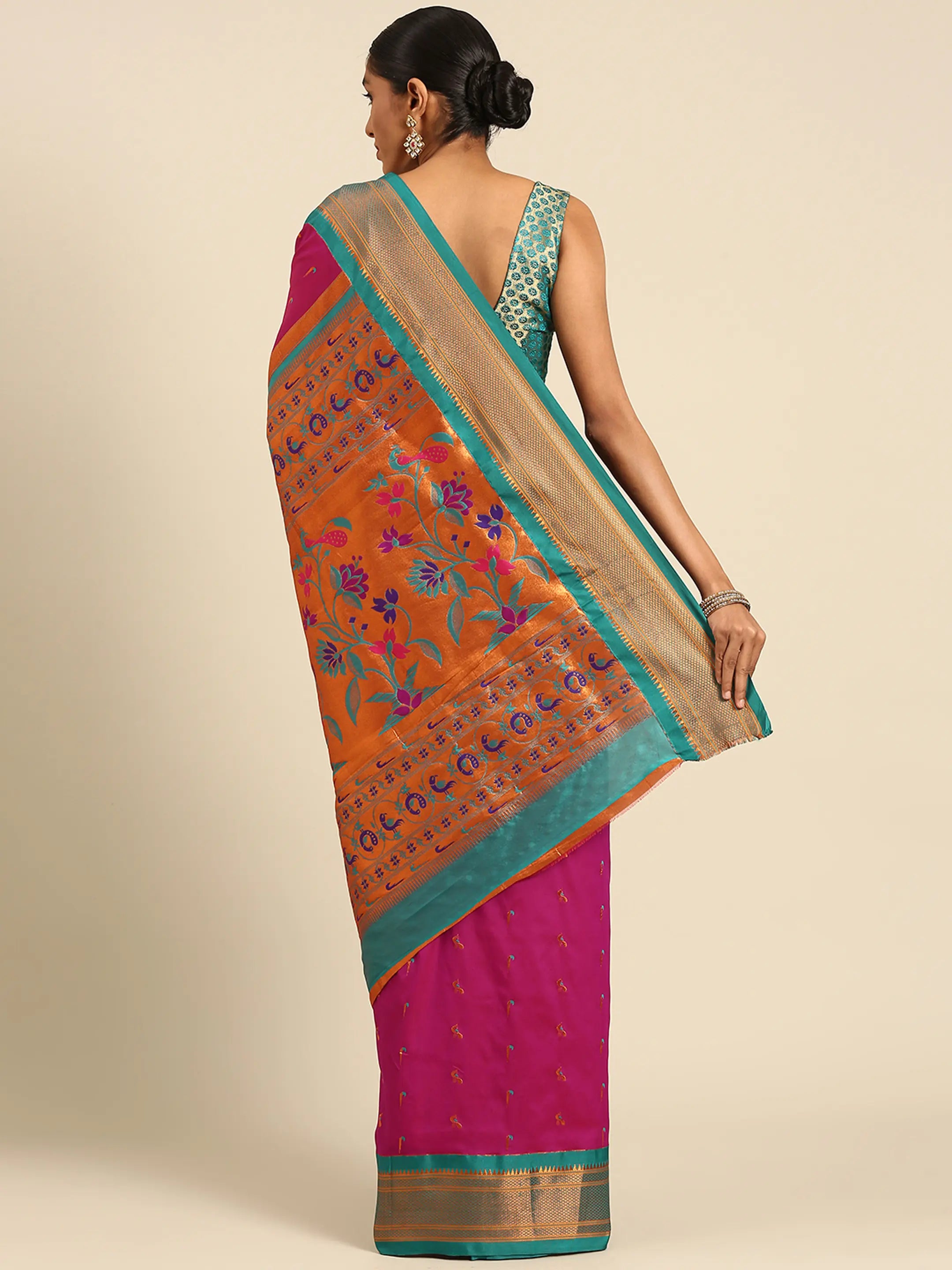 Muniya paithani saree silk blend in magenta and rama with muniya peacock meena butti - back view showing pallu and border for wedding wear