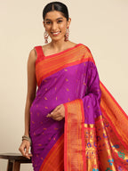 Muniya paithani saree silk blend in purple and red with muniya peacock meena butti - closeup view showing fabric and zari work for wedding wear