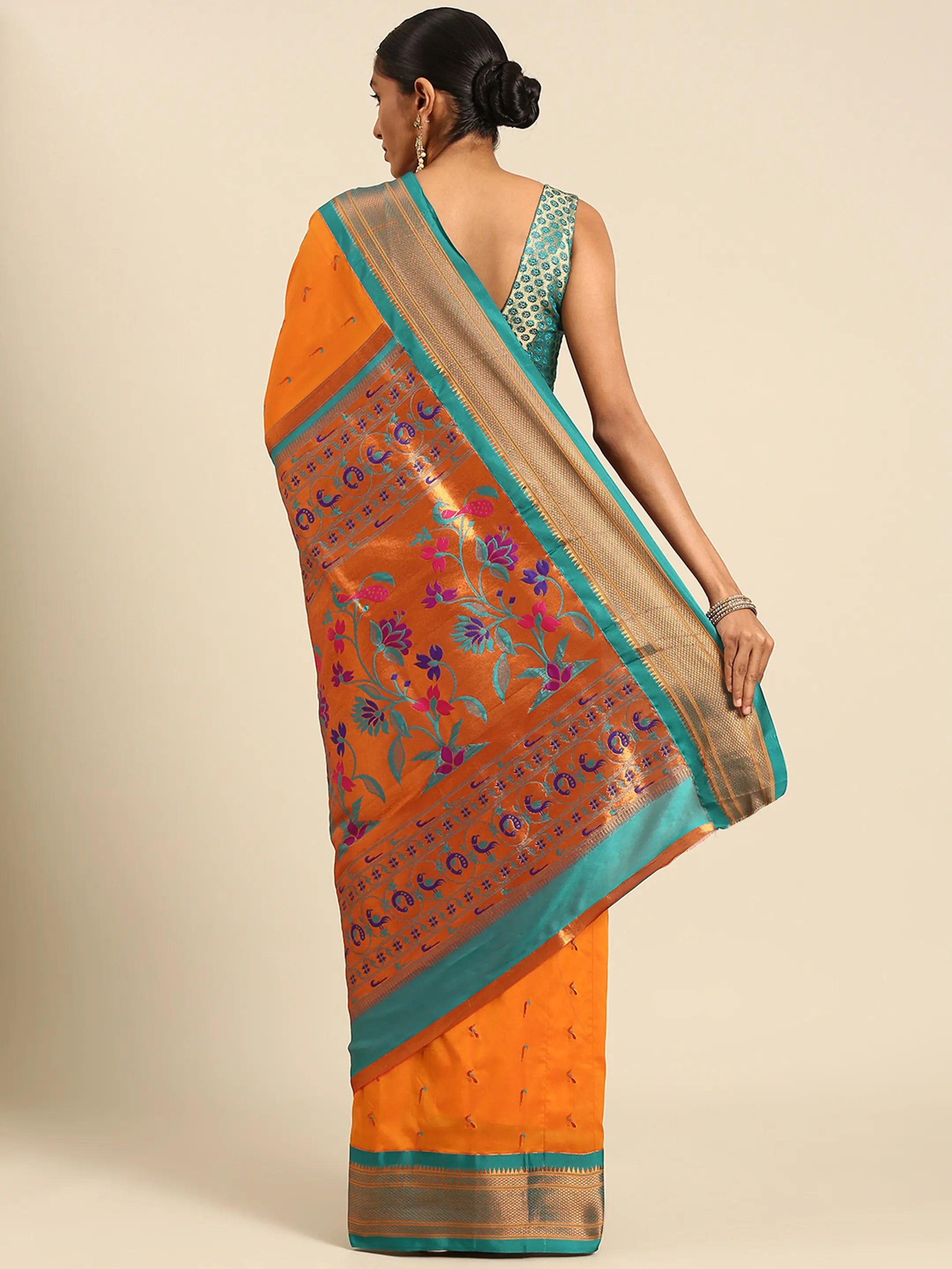 Muniya paithani saree silk blend in saffron and rama with muniya peacock meena butti - back view showing pallu and border for wedding wear