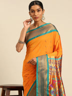 Muniya paithani saree silk blend in saffron and rama with muniya peacock meena butti - closeup view showing fabric and zari work for wedding wear