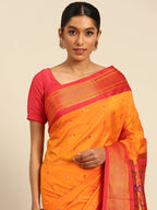 Muniya paithani saree silk blend in saffron and red with muniya peacock meena butti - closeup view showing fabric and zari work for wedding wear