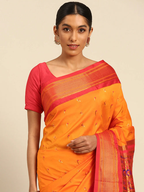 Muniya paithani saree soft silk in saffron and red with muniya peacock meena butti - closeup view showing fabric and zari work for wedding wear