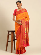Muniya paithani saree silk blend in saffron and red with muniya peacock meena butti - styled model view for wedding wear
