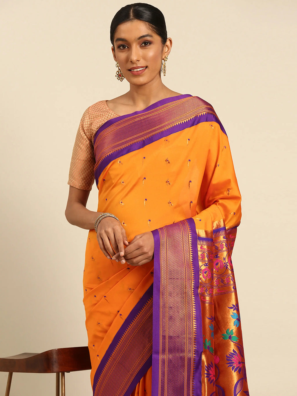 Muniya paithani saree silk blend in saffron and violet with muniya peacock meena butti - closeup view showing fabric and zari work for wedding wear