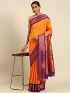 Muniya paithani saree silk blend in saffron and violet with muniya peacock meena butti - styled model view for wedding wear