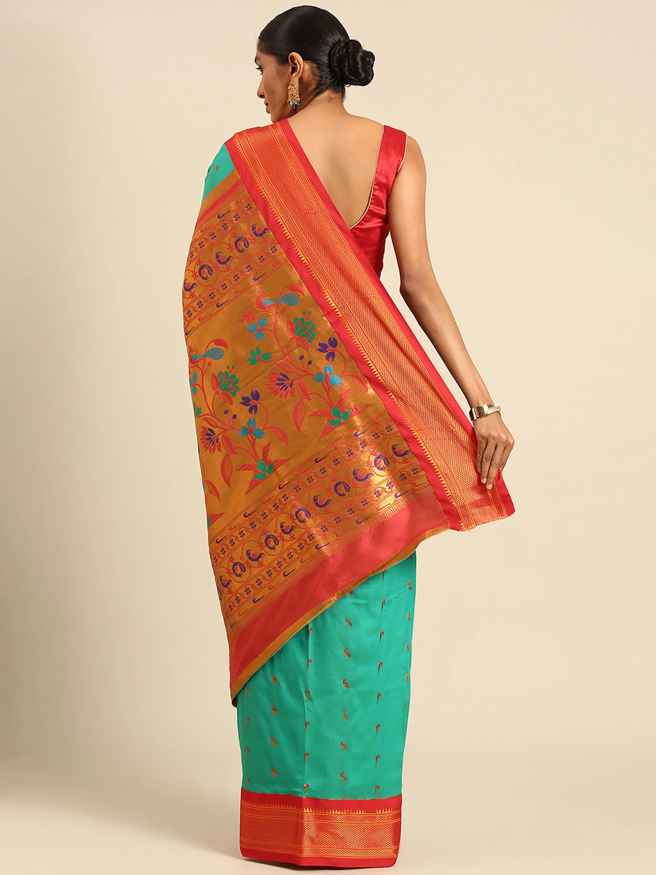 Muniya paithani saree silk blend in sea green and red with muniya peacock meena butti - back view showing pallu and border for wedding wear