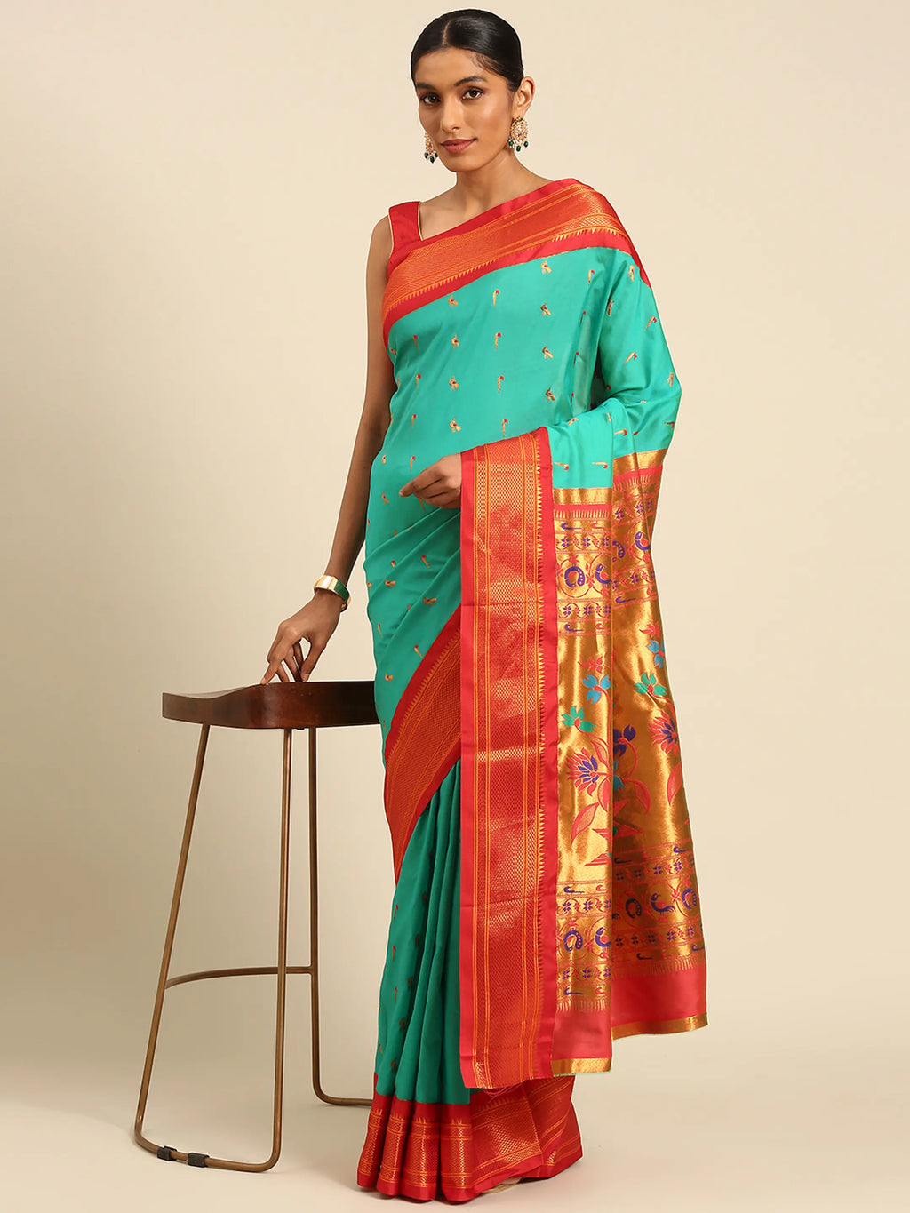 Muniya paithani saree silk blend in sea green and red with muniya peacock meena butti - styled model view for wedding wear