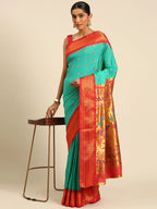 Muniya paithani saree silk blend in sea green and red with muniya peacock meena butti - styled model view for wedding wear