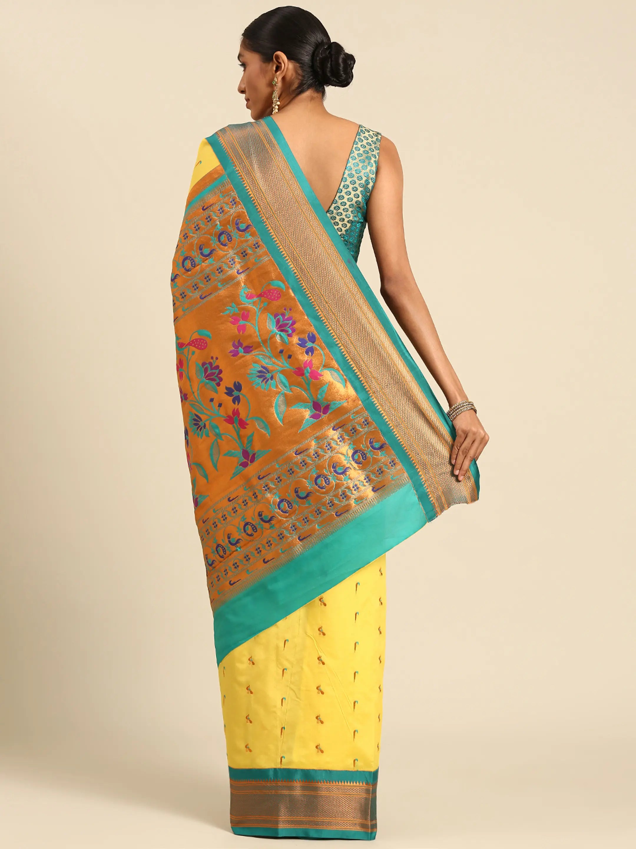 Muniya paithani saree silk blend in yellow and rama with muniya peacock meena butti - back view showing pallu and border for wedding wear