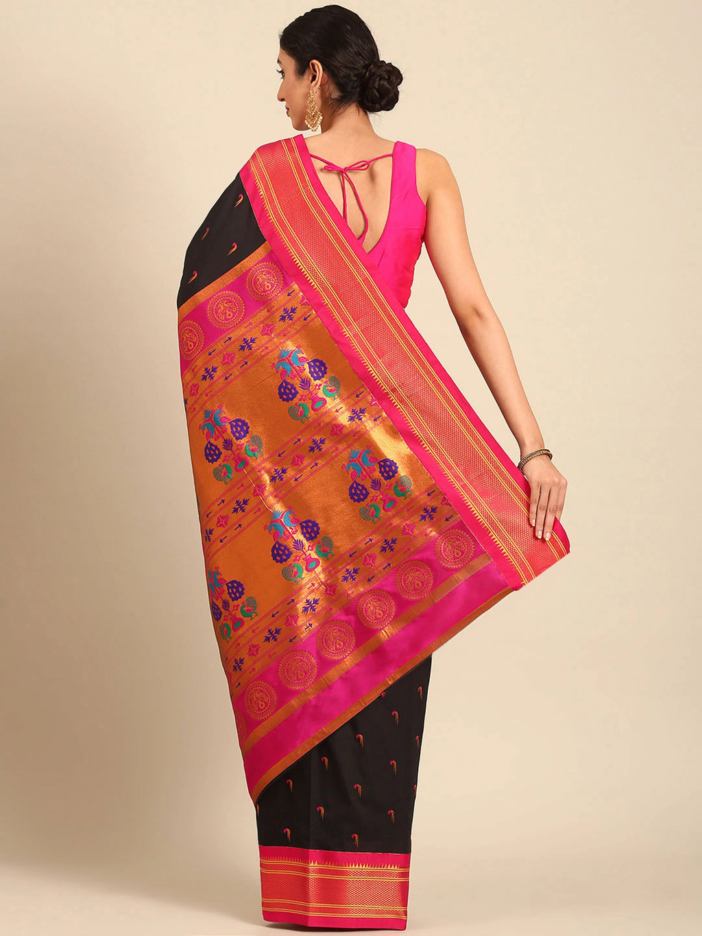 Muniya paithani saree silk blend in black and pink with parrot motif zari work - back view showing pallu and border for wedding wear