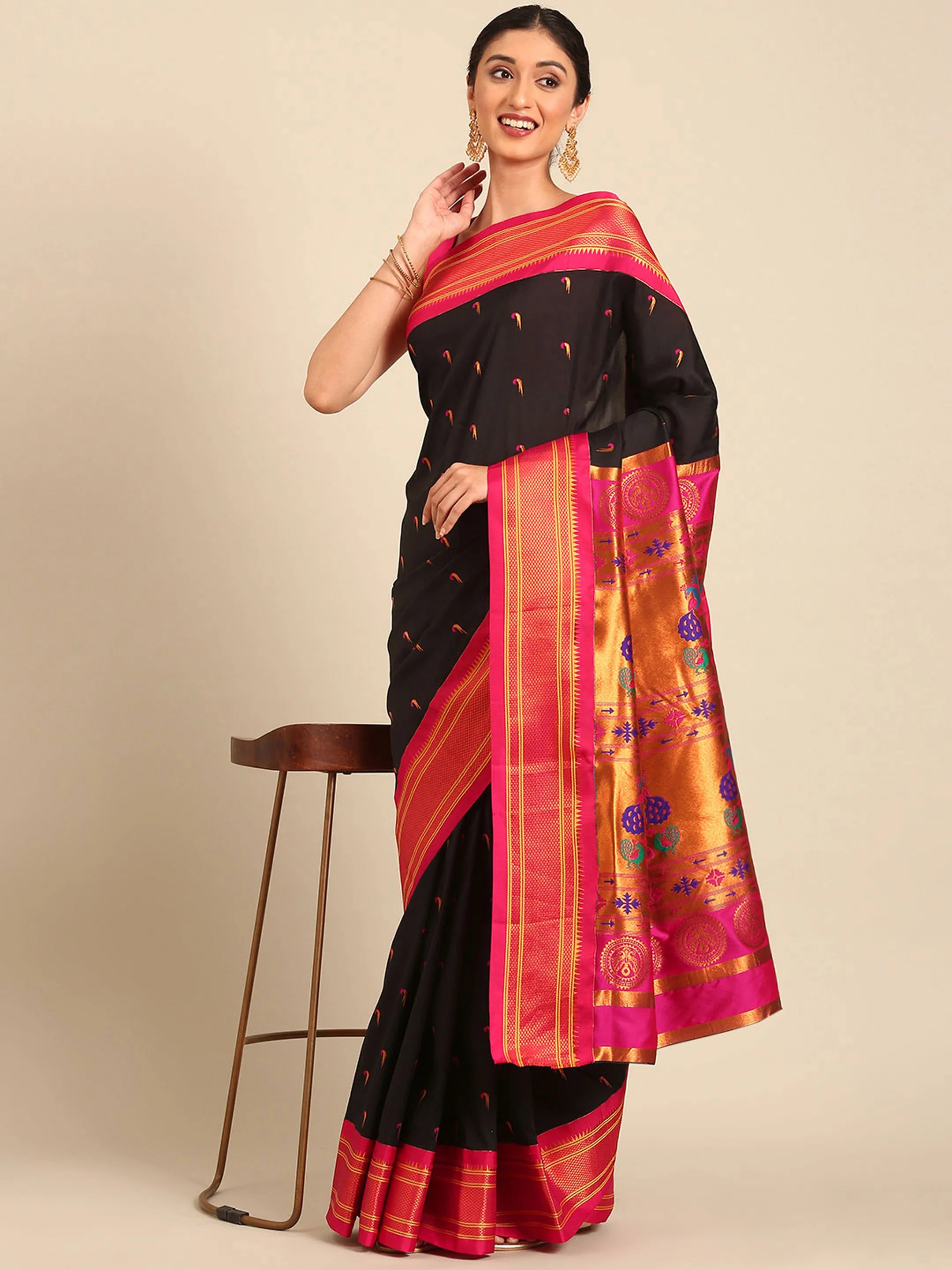 Muniya paithani saree silk blend in black and pink with parrot motif zari work - styled model view for wedding wear