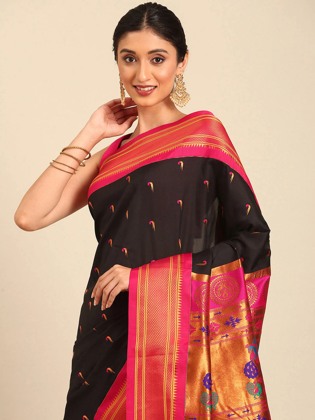 Muniya paithani saree silk blend in black and pink with parrot motif zari work - closeup view showing fabric and zari work for wedding wear