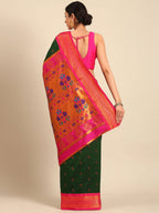 Muniya paithani saree silk blend in bottle green and pink with parrot motif zari work - back view showing pallu and border for wedding wear
