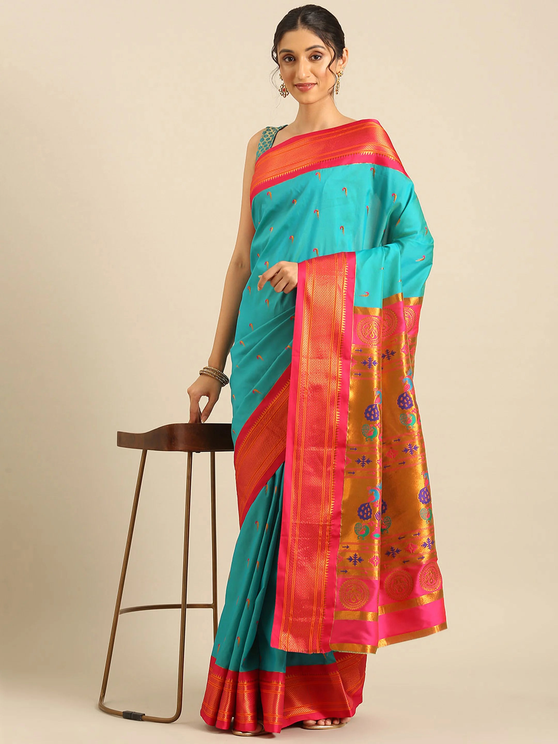 Muniya paithani saree silk blend in chintamani and pink with parrot motif zari work - styled model view for wedding wear
