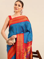 Muniya paithani saree silk blend in firozi and red with parrot motif zari work - closeup view showing fabric and zari work for wedding wear