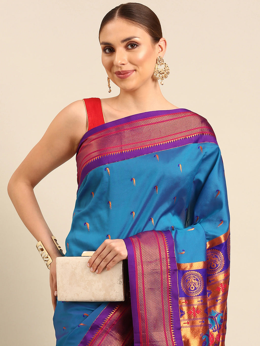 Muniya paithani saree silk blend in firozi and violet with parrot motif zari work - closeup view showing fabric and zari work for wedding wear