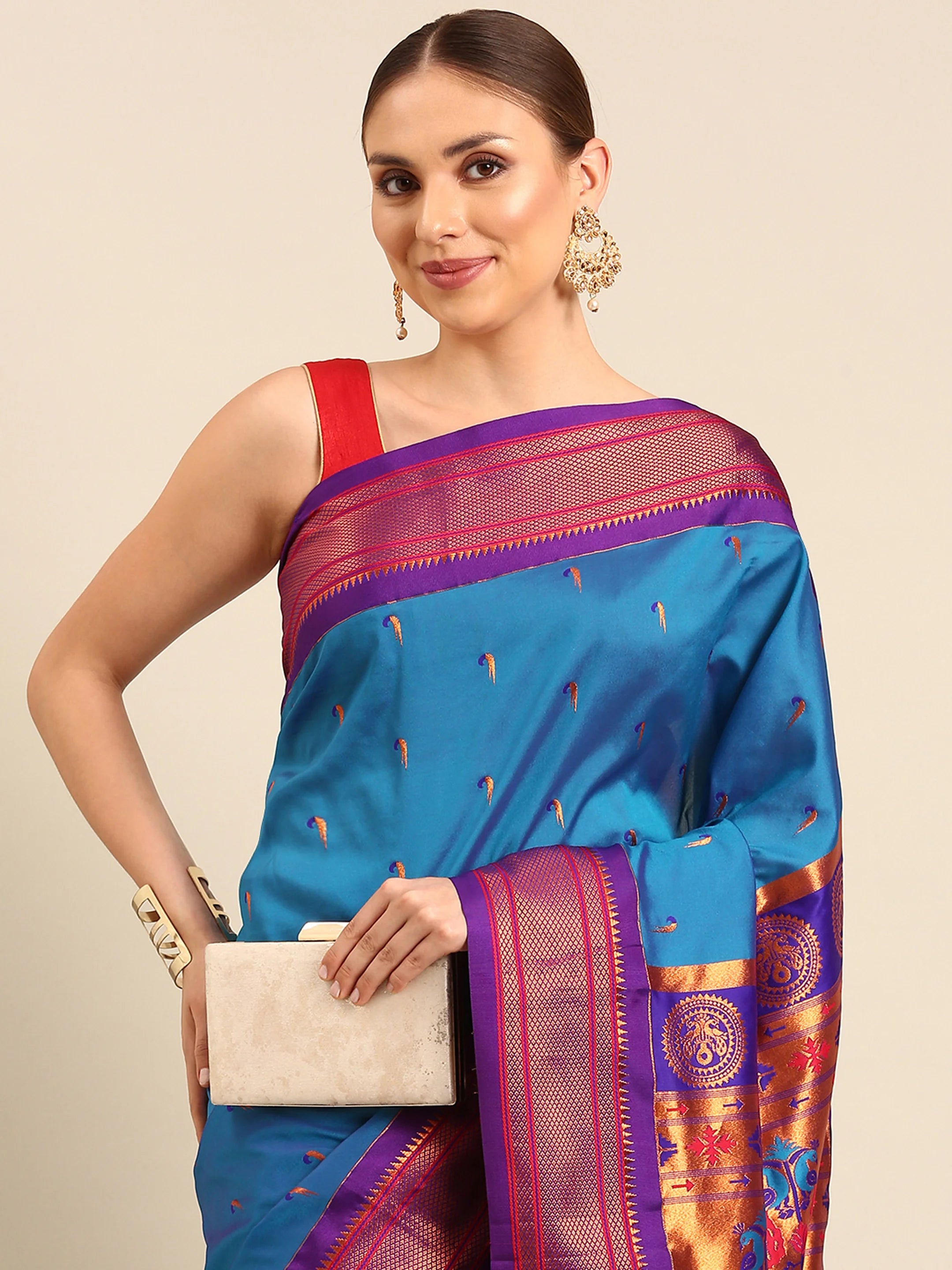 Muniya paithani saree silk blend in firozi and violet with parrot motif zari work - closeup view showing fabric and zari work for wedding wear