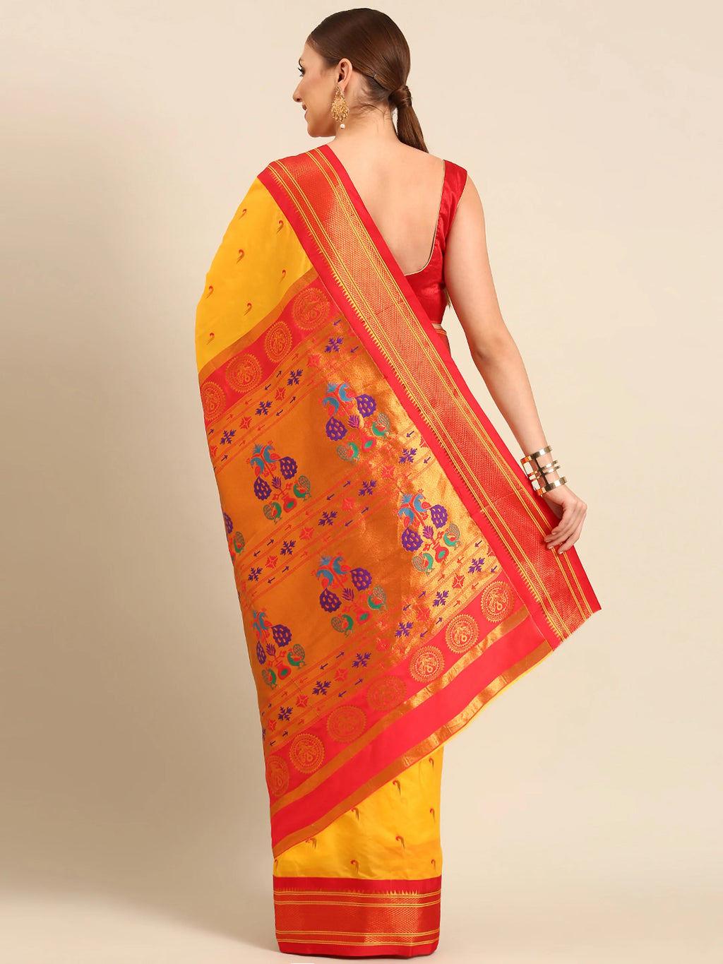 Muniya paithani saree silk blend in gold and red with parrot motif zari work - back view showing pallu and border for wedding wear