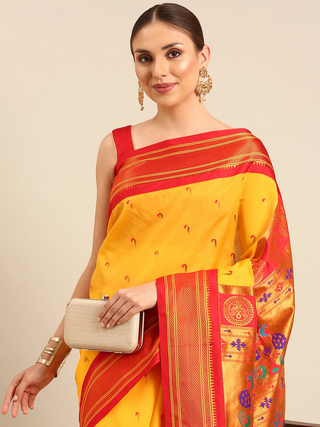Muniya paithani saree silk blend in gold and red with parrot motif zari work - closeup view showing fabric and zari work for wedding wear