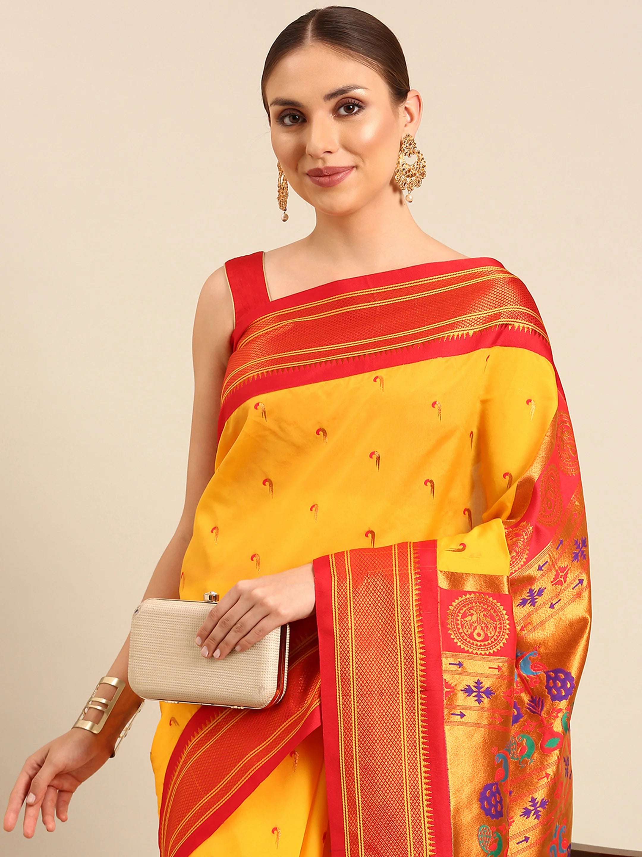 Muniya paithani saree silk blend in gold and red with parrot motif zari work - closeup view showing fabric and zari work for wedding wear