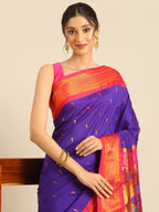 Muniya paithani saree silk blend in indigo blue and pink with parrot motif zari work - closeup view showing fabric and zari work for wedding wear