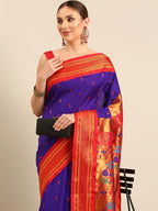 Muniya paithani saree silk blend in indigo blue and red with parrot motif zari work - closeup view showing fabric and zari work for wedding wear