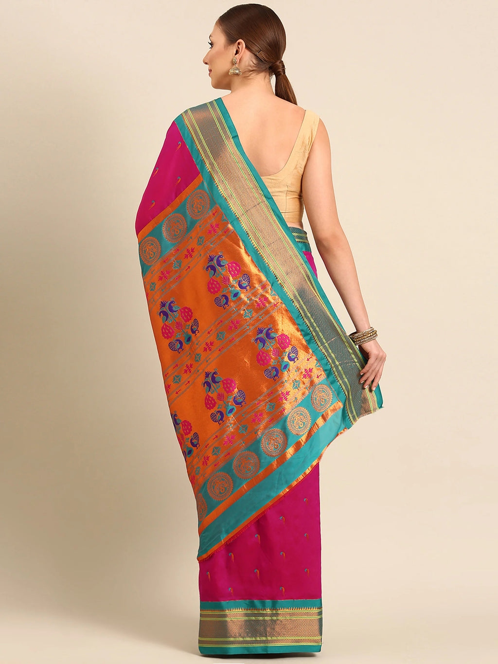 Muniya paithani saree silk blend in magenta and rama with parrot motif zari work - back view showing pallu and border for wedding wear