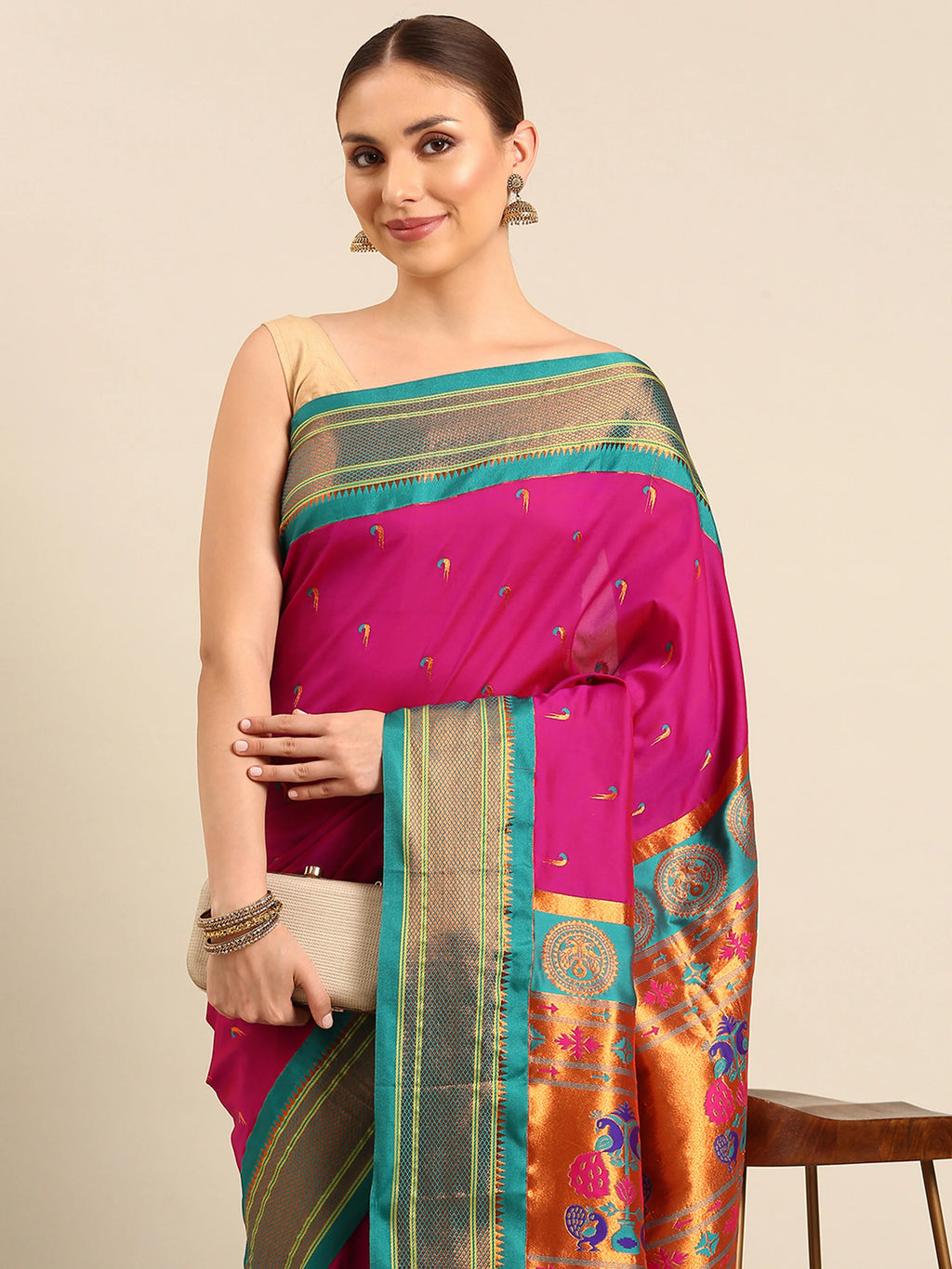Muniya paithani saree silk blend in magenta and rama with parrot motif zari work - closeup view showing fabric and zari work for wedding wear