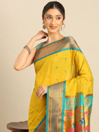 Muniya paithani saree silk blend in mustard yellow and rama with parrot motif zari work - closeup view showing fabric and zari work for wedding wear