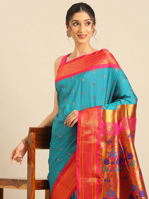 Muniya paithani saree soft silk in rama green and pink with parrot motif zari work - closeup view showing fabric and zari work for wedding wear
