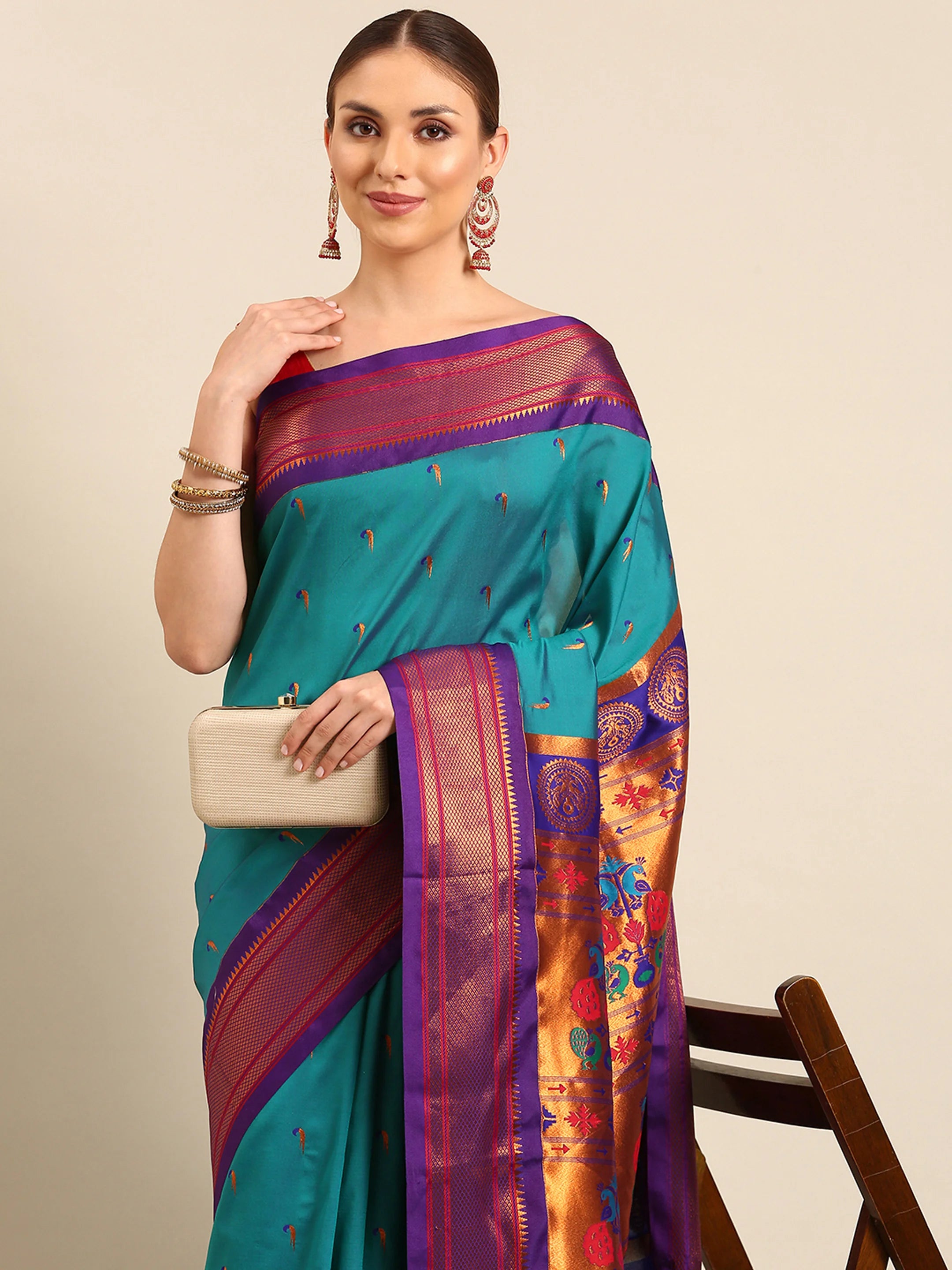 Muniya paithani saree silk blend in rama green and violet with parrot motif zari work - closeup view showing fabric and zari work for wedding wear