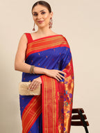 Muniya paithani saree silk blend in royal blue and red with parrot motif zari work - closeup view showing fabric and zari work for wedding wear
