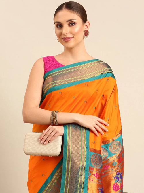 Muniya paithani saree soft silk in saffron and rama with parrot motif zari work - closeup view showing fabric and zari work for wedding wear