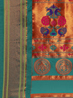 Muniya paithani saree silk blend in saffron and rama with parrot motif zari work - pallu detail showing woven motif design for wedding wear