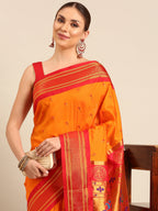 Muniya paithani saree silk blend in saffron and red with parrot motif zari work - closeup view showing fabric and zari work for wedding wear