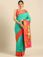 Muniya paithani saree silk blend in sea green and pink with parrot motif zari work - front view for wedding wear