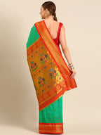 Muniya paithani saree silk blend in sea green and red with parrot motif zari work - back view showing pallu and border for wedding wear
