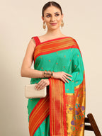 Muniya paithani saree silk blend in sea green and red with parrot motif zari work - closeup view showing fabric and zari work for wedding wear