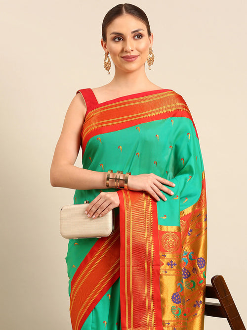 Muniya paithani saree soft silk in sea green and red with parrot motif zari work - closeup view showing fabric and zari work for wedding wear