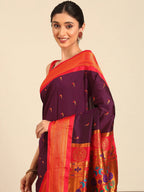 Muniya paithani saree silk blend in wine red with parrot motif zari work - closeup view showing fabric and zari work for wedding wear