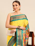 Muniya paithani saree silk blend in yellow and rama with parrot motif zari work - closeup view showing fabric and zari work for wedding wear